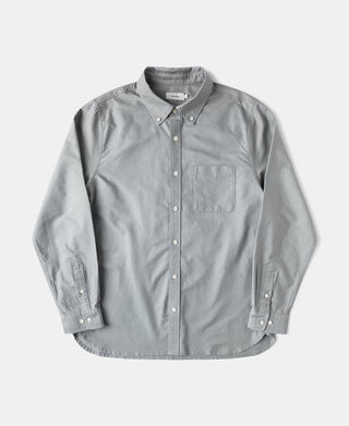Gray button-down oxford shirt with front pocket and button placket