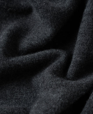 Heather gray merino wool sweater fabric texture close-up