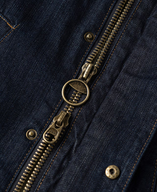 Indigo denim jacket front zipper with antique-style metal pull and snap tab