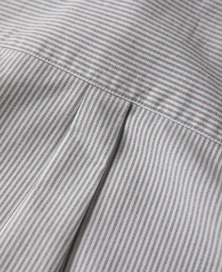 Striped shirt chest panel with diagonal seam, close-up