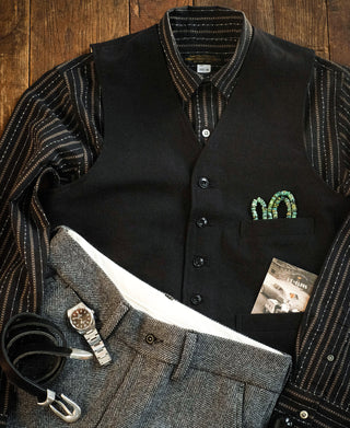 Black work shirt with fine jacquard stripes, pointed collar, and button front