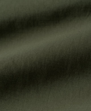Olive cotton sateen fabric with fine twill-like texture