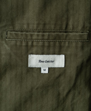 Olive herringbone blazer size M care label on inner lining