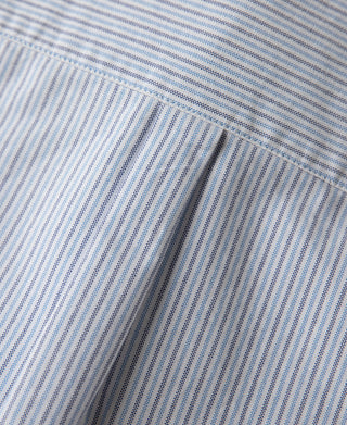 Blue and white striped oxford fabric seam and edge detail
