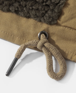 Khaki deck vest hem with braided drawcord and metal eyelet