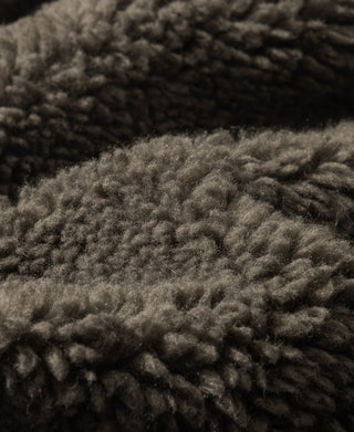Close-up of the deck vest's thick, dark curly lining
