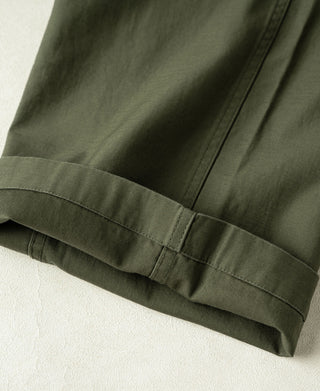 Olive cargo trouser hem with gathered cuff and seam stitching