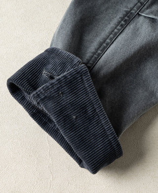 Gray-blue canvas jacket with dark ribbed knit cuff