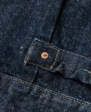 Indigo Type 1 denim jacket chest button and flap detail, copper-toned shank