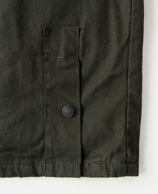 Olive canvas field jacket hanging tab with snap button and rectangular reinforcement