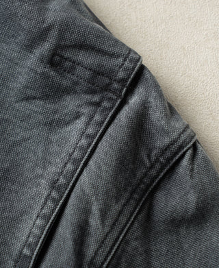 Gray-blue canvas hunting jacket shoulder seam detail