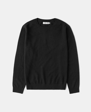 Black crewneck sweater with long sleeves, ribbed collar, cuffs, and hem