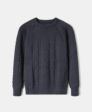 Dark blue cable knit sweater with crew neck, long sleeves, and vertical aran cable panels