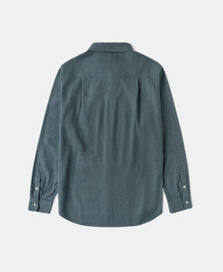 Blue brushed cotton flannel work shirt, back view with yoke and long sleeves.