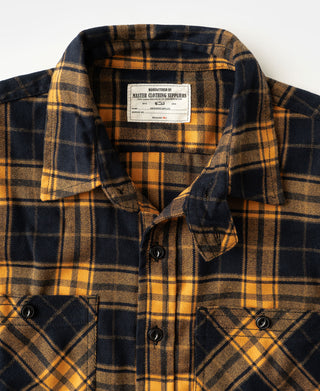 Yellow and navy plaid work shirt collar and front buttons with interior label