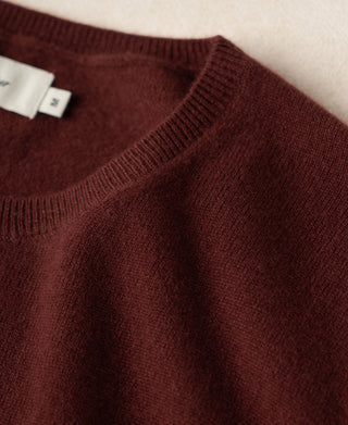 Maroon knit crewneck sweater with ribbed neckline