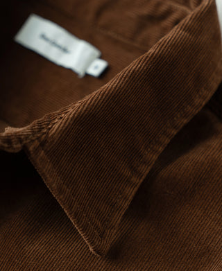 Brown corduroy shirt close-up of collar and textured fabric weave
