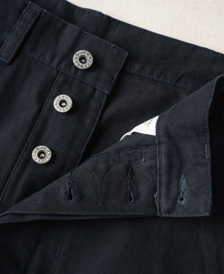 Navy waistband and pocket facing with metal button details