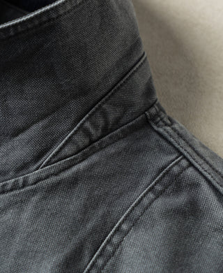 Gray-blue field jacket showing the collar and shoulder seam