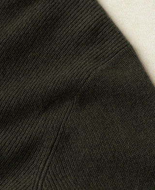 Olive knit cardigan sleeve and seam detail with ribbed knit finish