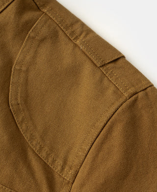Khaki cotton canvas jacket close-up of shoulder seam and curved yoke