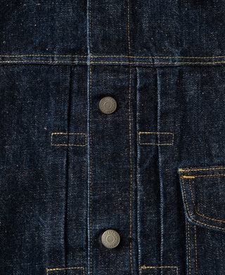 Indigo denim jacket interior facing with two metal snaps and grid topstitching