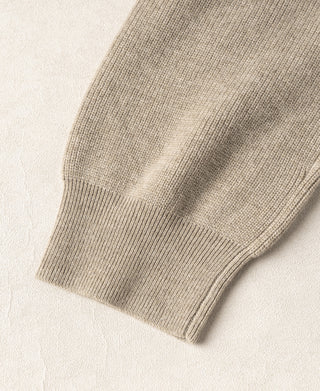 Ecru knit cardigan ribbed cuff and sleeve hem detail