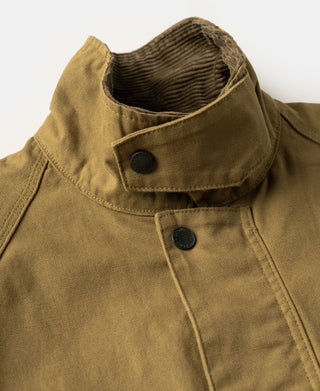 Khaki field jacket neck detail with ribbed inner collar and two-button closure