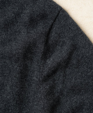 Heather gray merino wool crewneck sweater side view with ribbed cuff