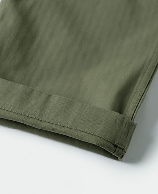 Olive fatigue trousers hem with stitched cuff and side seam detail