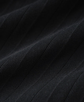 Vintage black ribbed cotton fabric texture close-up