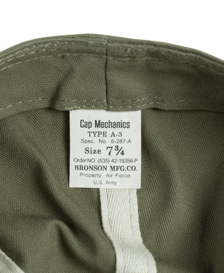 Olive A-3 cap interior label with printed size and Air Force details