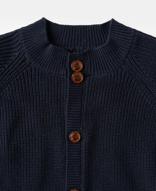 Close-up of the stand collar and button placket on a heavyweight Dark Blue wool-blend cardigan.