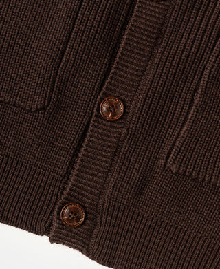 Close-up of wooden buttons and ribbed button placket on a heavyweight coffee cardigan sweater.