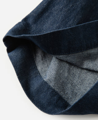 leg opening detail of Indigo Relaxed Double-Pleated Hemp-Cotton Shorts