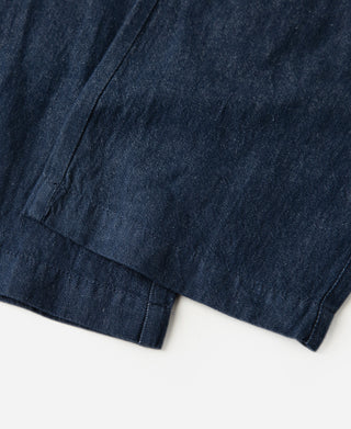 leg opening detail of Indigo Tapered Hemp-Cotton Blend Pants