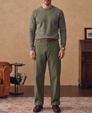 Merino wool crewneck sweater in grayish green, crew neck and long sleeves on model