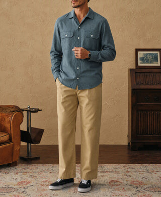 Blue brushed cotton flannel work shirt with pointed collar, button front, two chest pockets.
