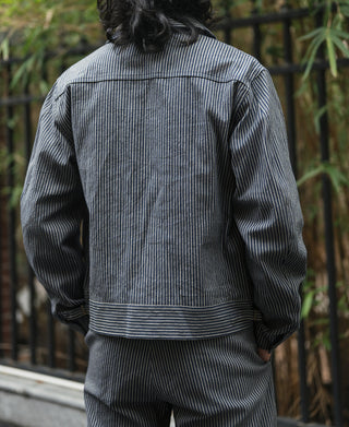 Striped cossack jacket back view with stand collar and buttoned cuffs