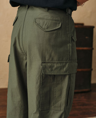 Olive field cargo trousers featuring side cargo pocket and back flap pocket