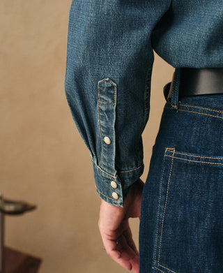 Denim shirt sleeve with buttoned placket and round cuff snaps