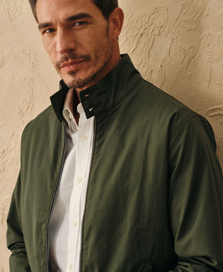 Olive Harrington jacket on model, full-zip front and stand collar